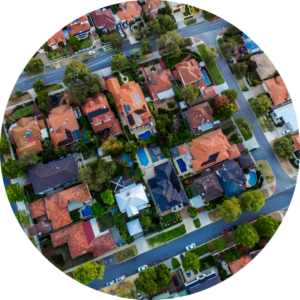 An aerial view of houses neatly arranged in a neighborhood